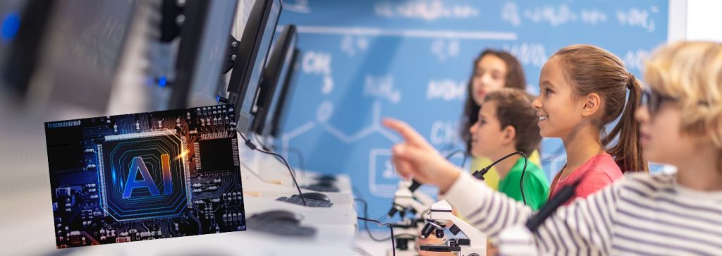 Dzieci siedzące w klasie przed mikroskopami podłączonymi do komputerów